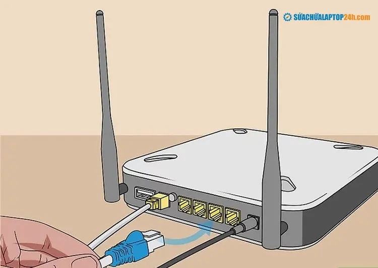 Cắm một đầu của cáp Ethernet khác vào bộ định tuyến