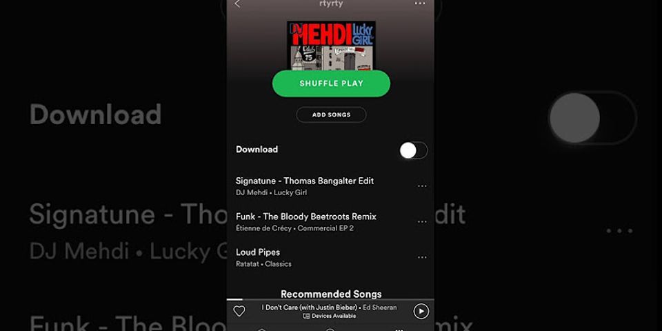 How do you select multiple songs on a Spotify playlist?